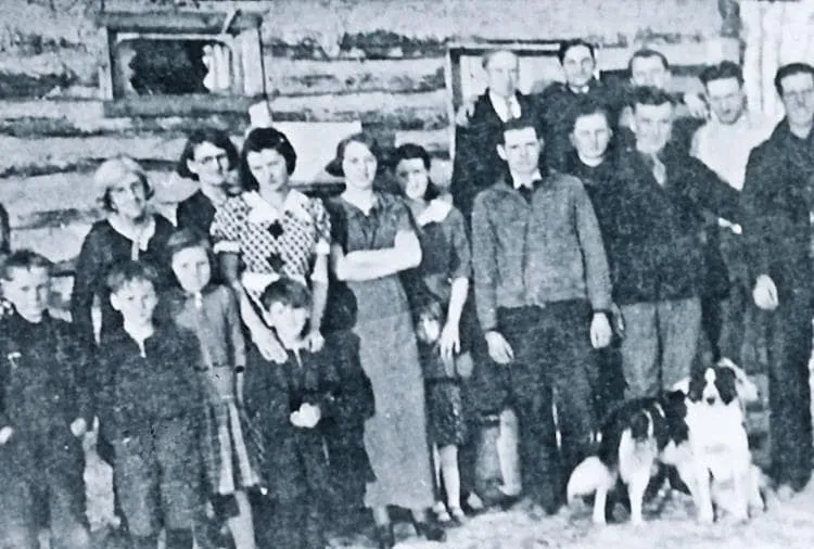 Greenmantle Homesteaders in front of Sam Reed's new house, in 1937/1938.