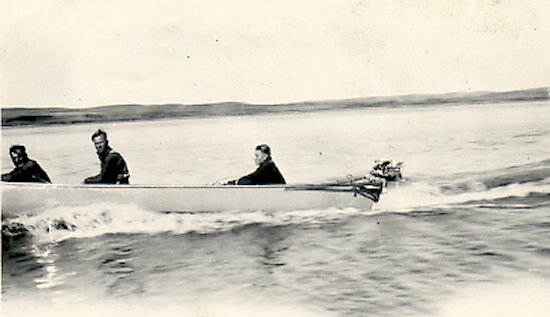 Fred Darbyshire and unidentified trappers in a canoe