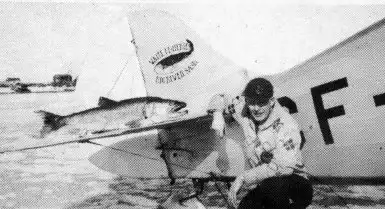 George Greening, with a large lake trout on the stabilzer