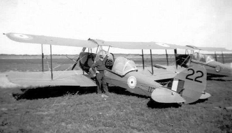 Max next to Tiger Moth number 1122 at Assiniboia.